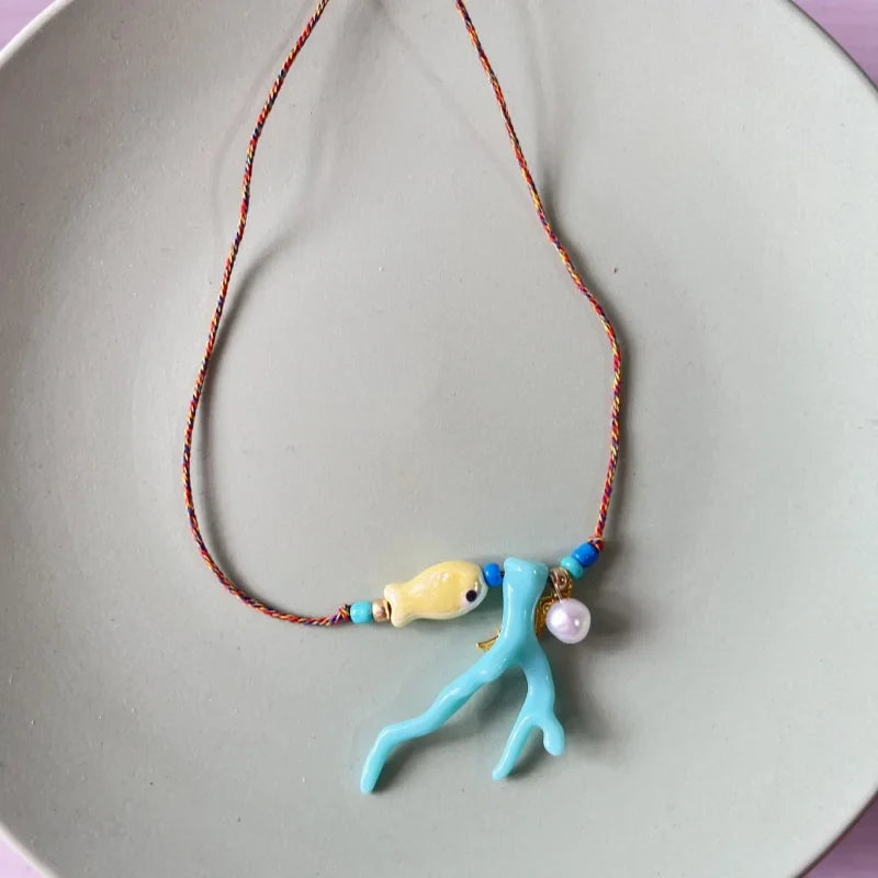 Necklace with Coral and Blue Fish Pendant