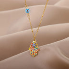 Collier avec pendentif de protection contre le mauvais œil et main de Fatma multicolore arabe or