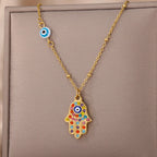 Collier avec pendentif de protection contre le mauvais œil et main de Fatma multicolore arabe or