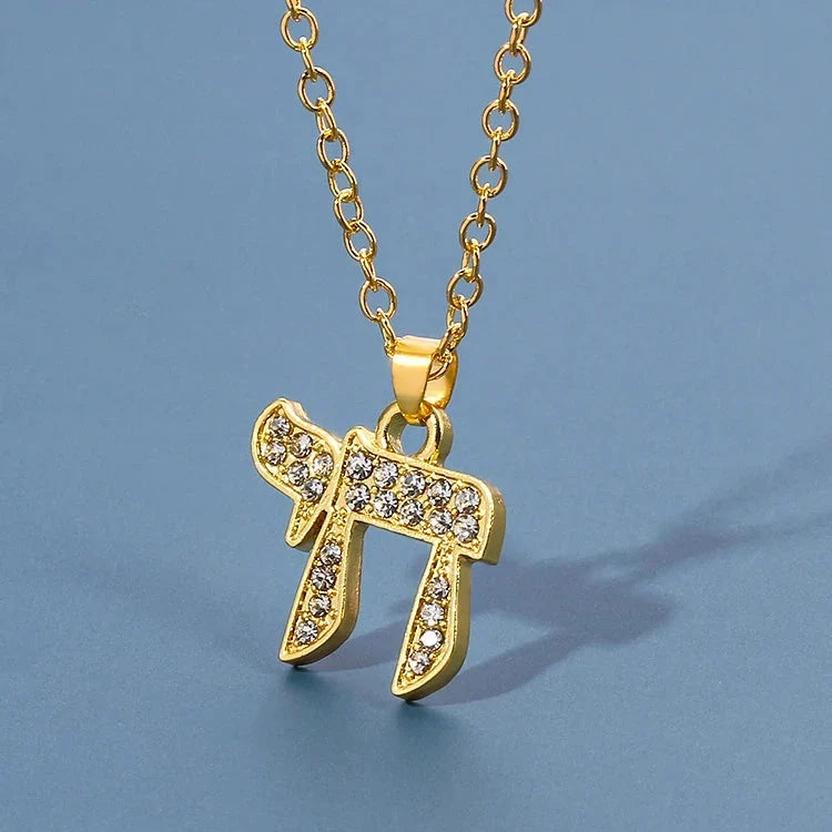Collier avec pendentif en strass du symbole de vie juive Chai or