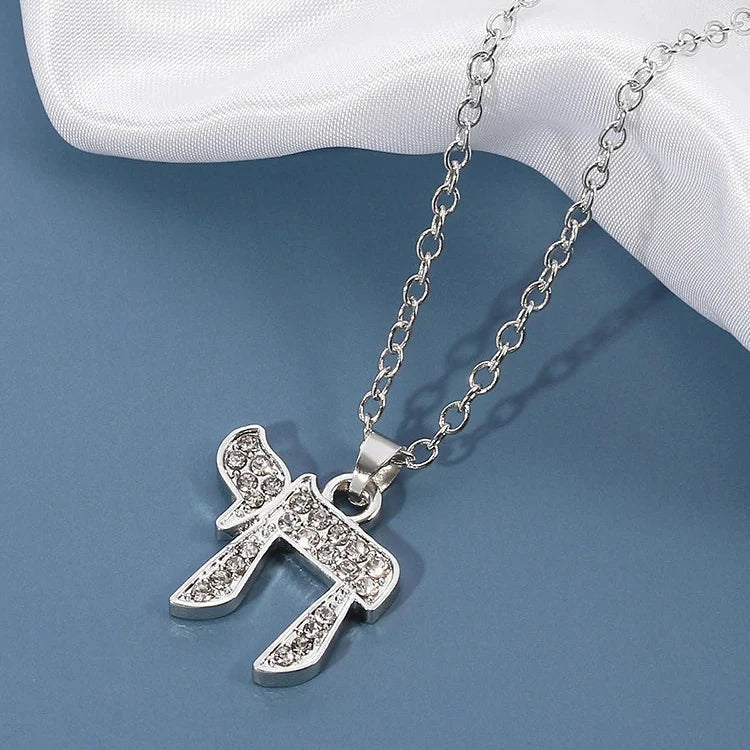 Collier avec pendentif en strass du symbole de vie juive Chai argent