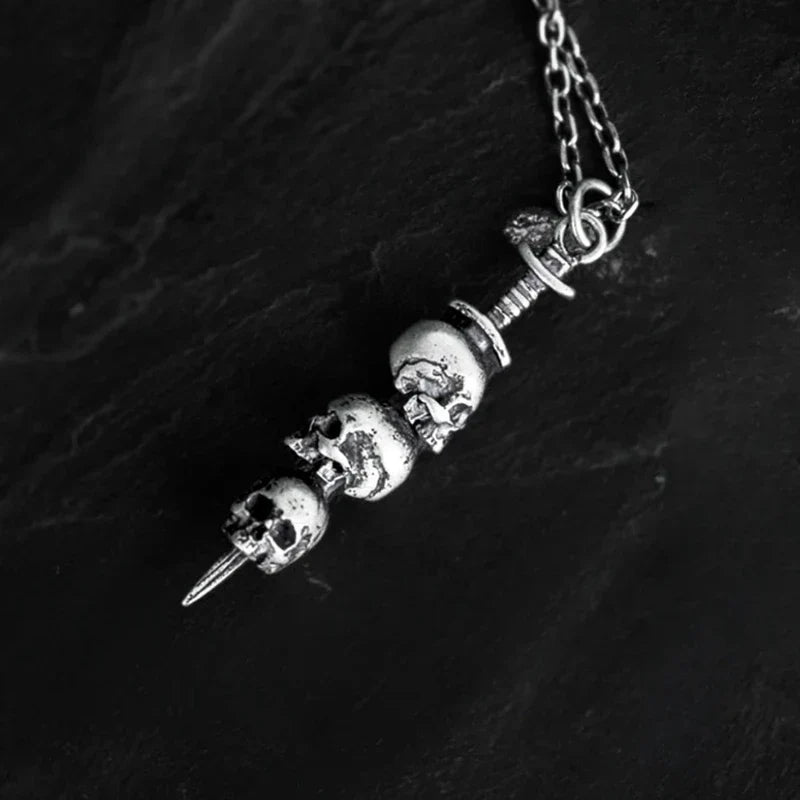 Necklace with Sword Pendant and Skull Heads