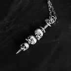 Necklace with Sword Pendant and Skull Heads