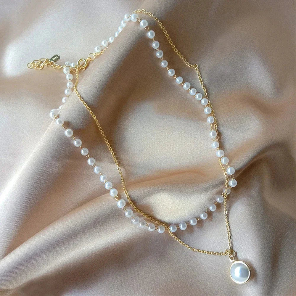 Necklace with Gold White Pearl Pendant