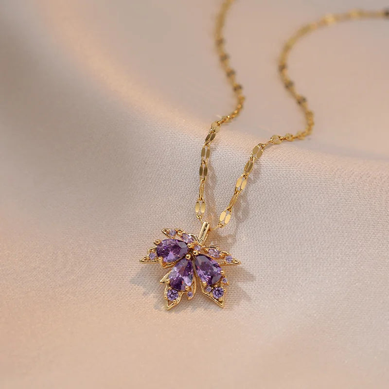 Necklace with Purple Colored Maple Leaf Pendant