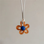 Necklace with Brown Colored Flower Pendant