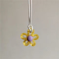 Necklace with Beige Colored Flower Pendant