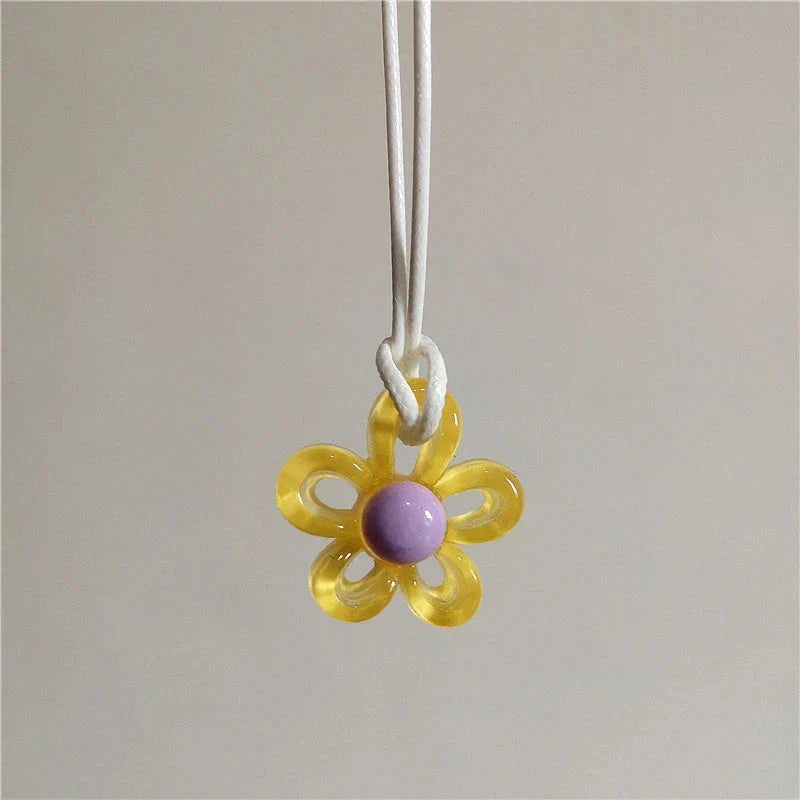 Necklace with Beige Colored Flower Pendant