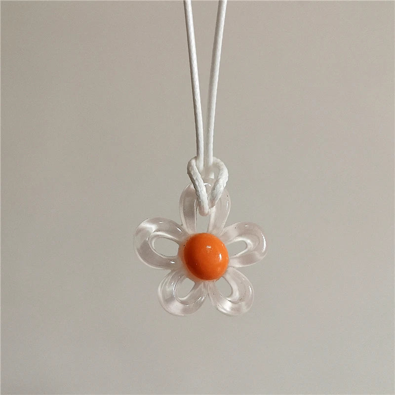 Necklace with White Colored Flower Pendant