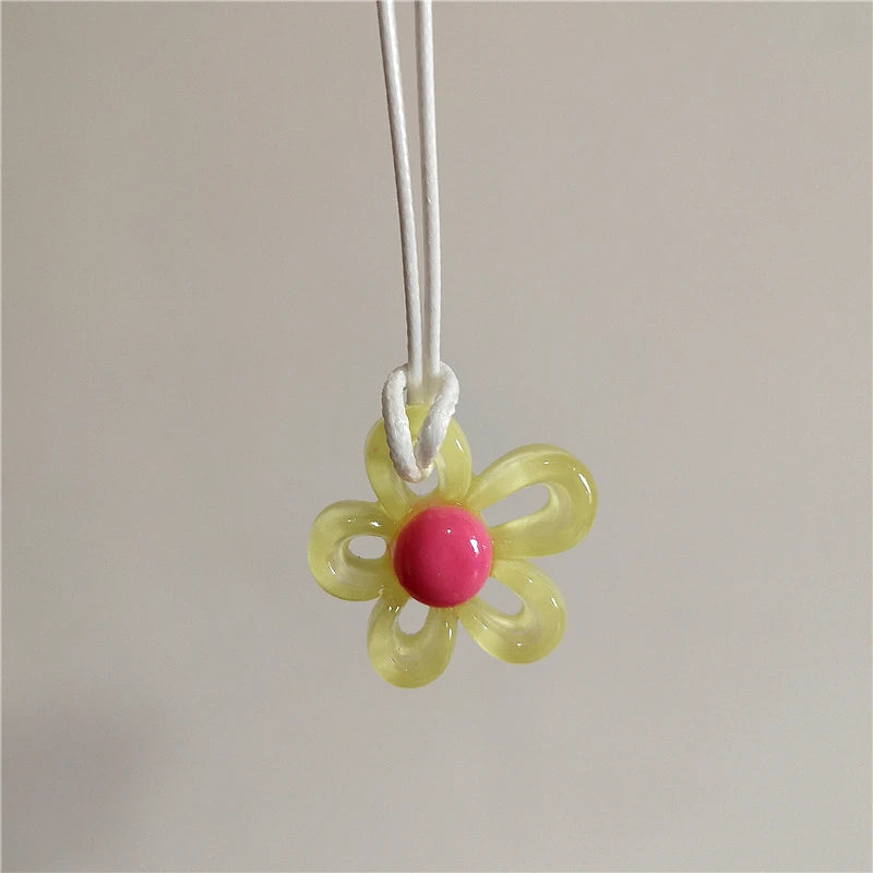 Necklace with Yellow Colored Flower Pendant