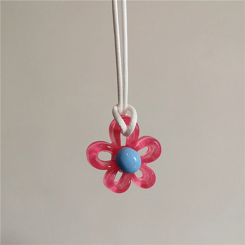 Necklace with Red Colored Flower Pendant