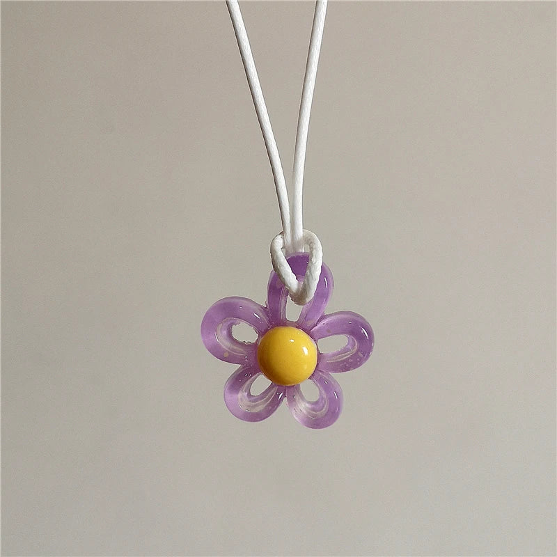 Necklace with Purple Colored Flower Pendant