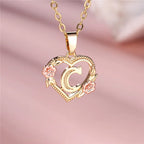 Collier avec pendentif initiale coeur et fleurs c