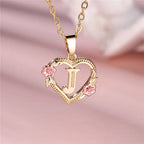 Collier avec pendentif initiale coeur et fleurs j