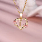 Collier avec pendentif initiale coeur et fleurs l