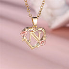 Collier avec pendentif initiale coeur et fleurs n