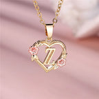 Collier avec pendentif initiale coeur et fleurs z
