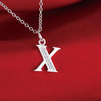 Collier long avec pendentif initiale  x