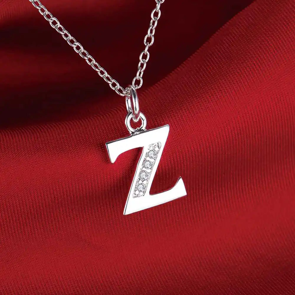 Collier long avec pendentif initiale  z