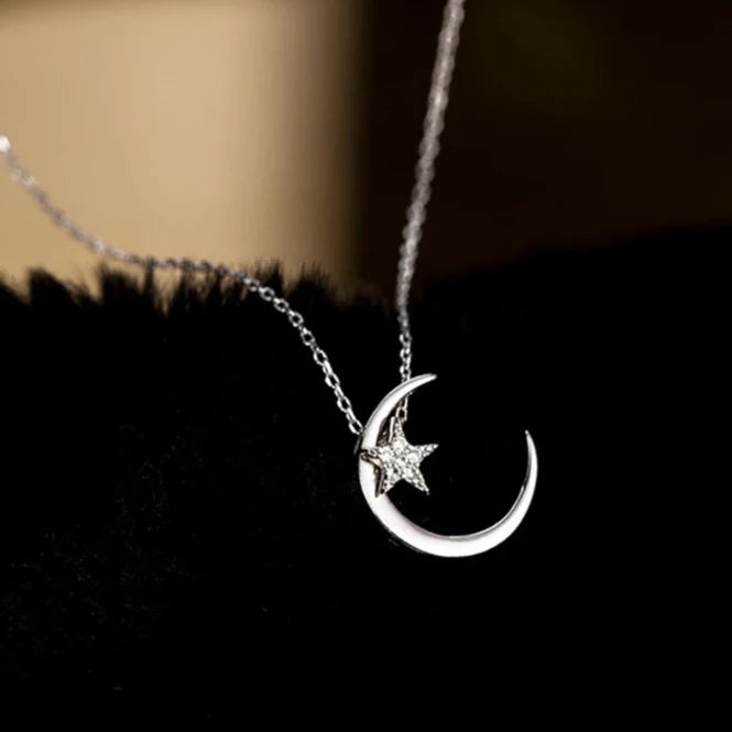 Necklace with Moon and Star Pendant in Crystal
