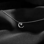 Necklace with Moon and Star Pendant in Crystal