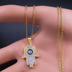 Collier long avec pendentif de protection contre le mauvais œil et main de Fatma arabe or