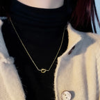 Collier avec pendentif noeud pour femme