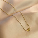 Collier avec pendentif noeud pour femme