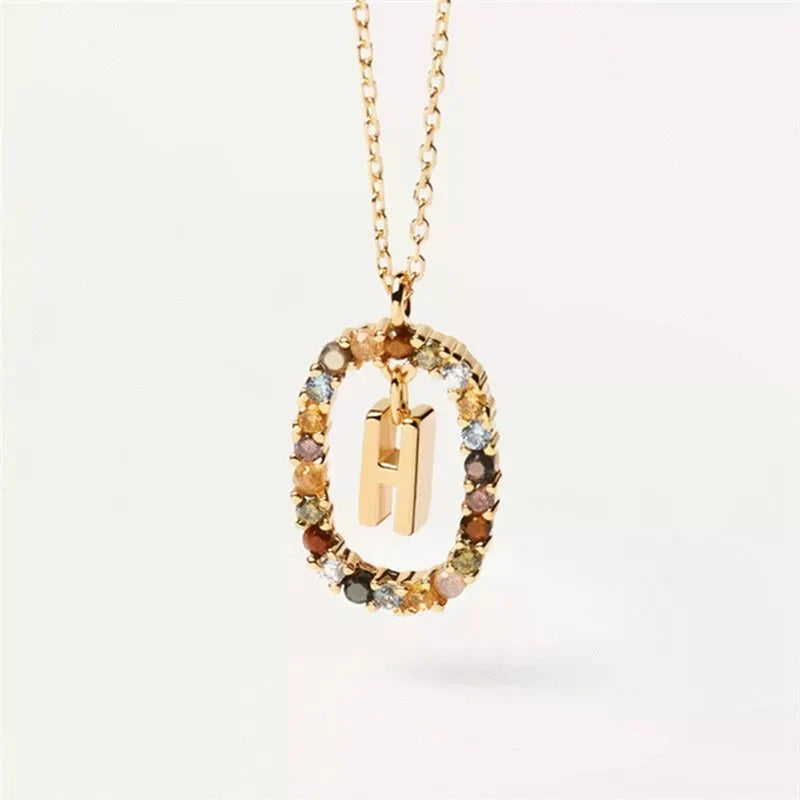 Collier avec pendentif ovale initiale h