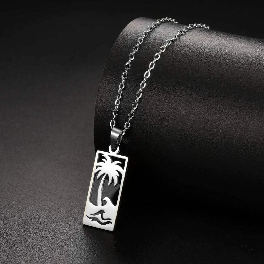 Collier avec pendentif palmier et vague de plage argent