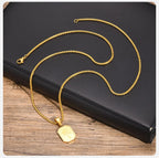 Collier avec pendentif palmier géométrique