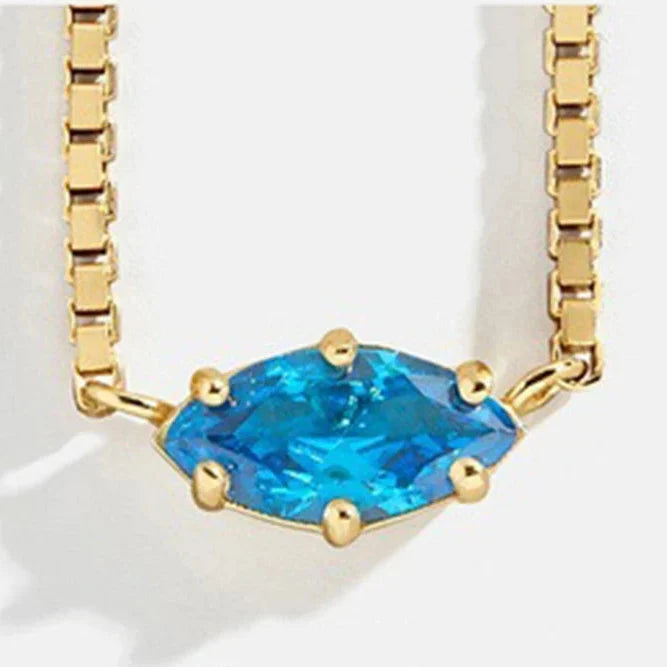 Collier avec pendentif pierre de naissance en forme d'oeil décembre