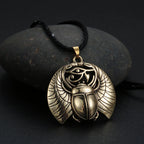 Necklace with Rose Gold Egyptian Scarab and Eye of Horus Pendant