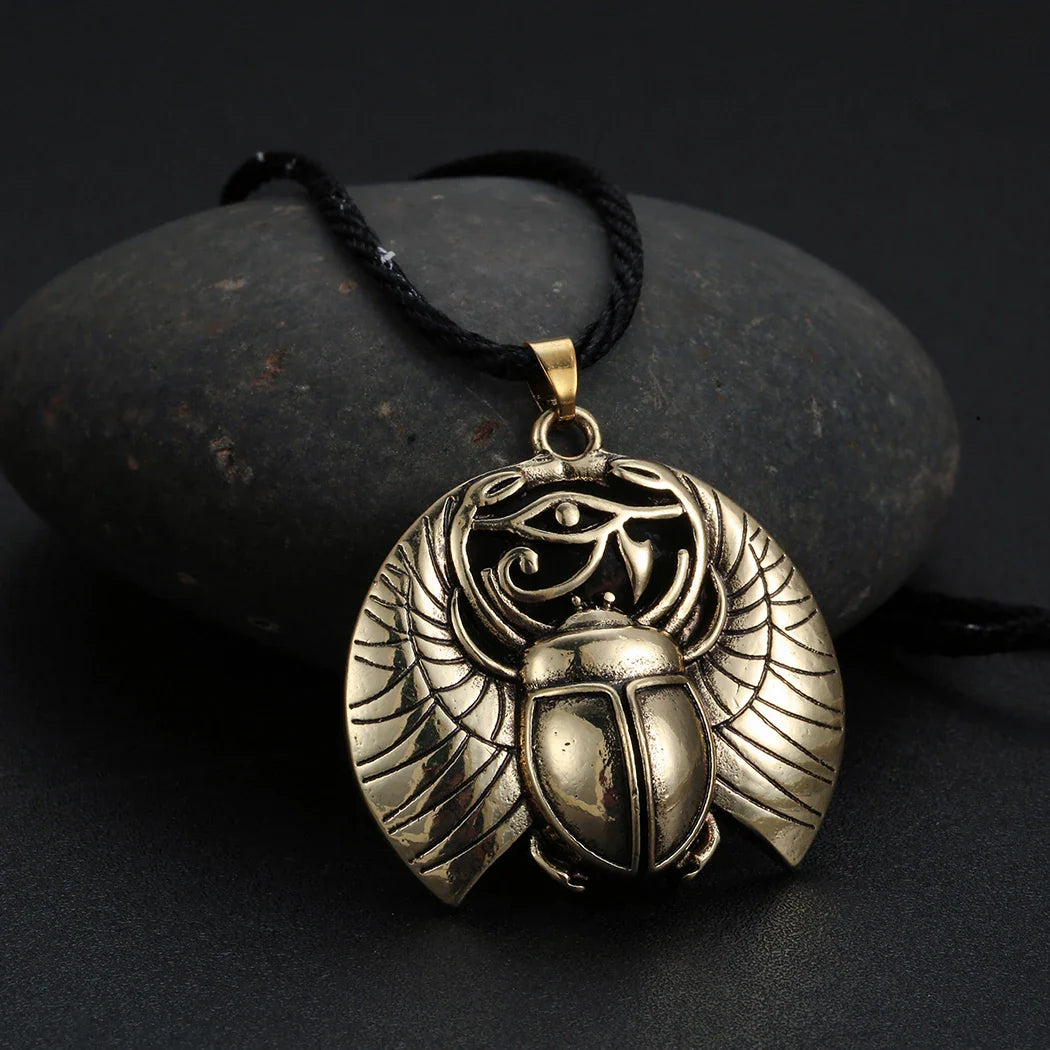 Necklace with Rose Gold Egyptian Scarab and Eye of Horus Pendant