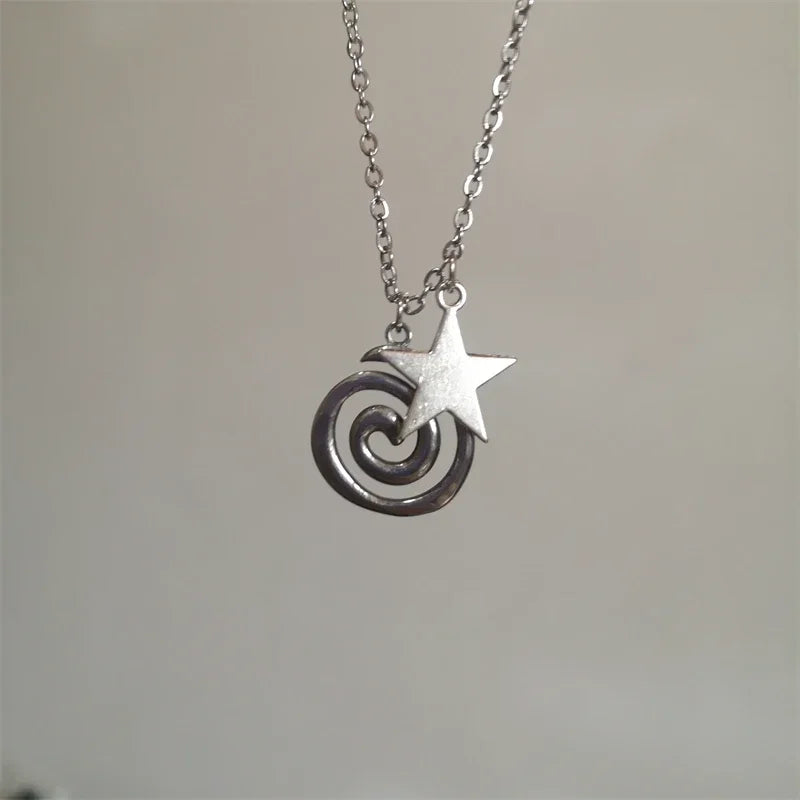 Collier avec pendentif spirale et petite étoile