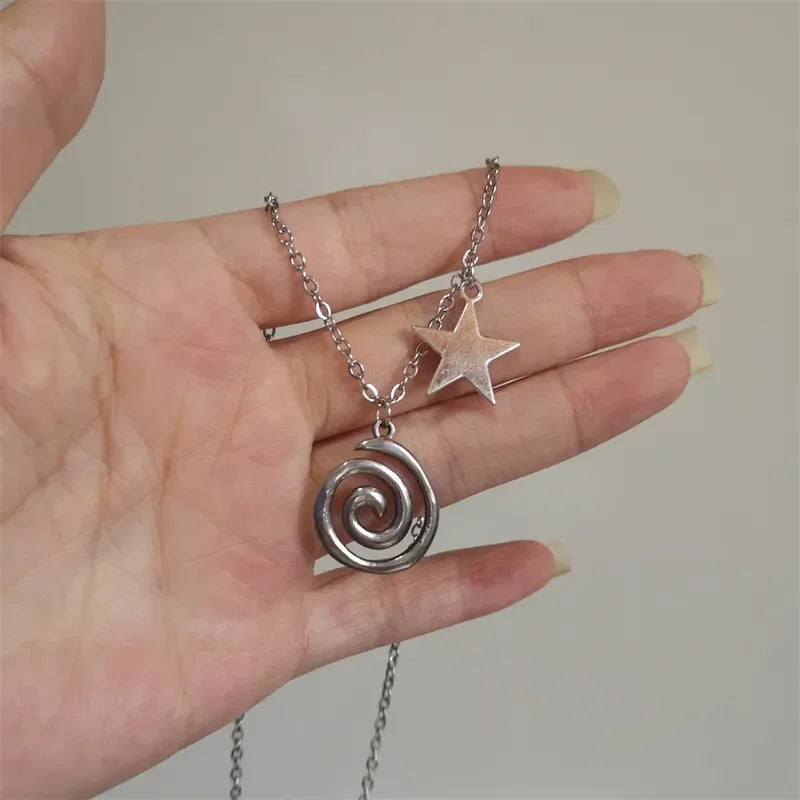 Collier avec pendentif spirale et petite étoile