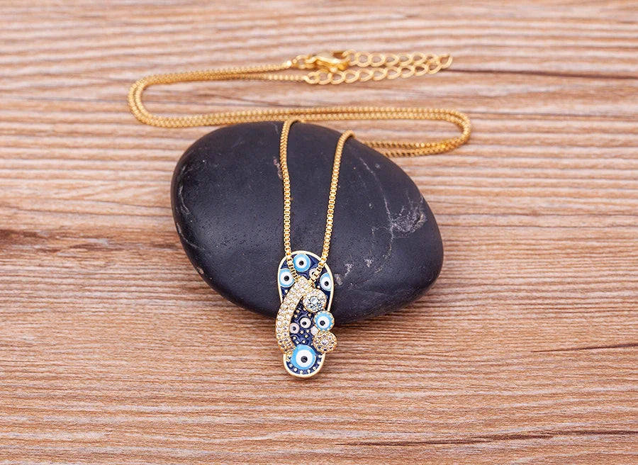 Necklace With Blue Eye Tongue Pendant And Zircon