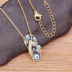 Necklace With Blue Eye Tongue Pendant And Zircon