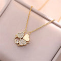 Necklace with Four-Leaf Clover Heart Pendants gold