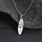 Collier avec petit pendentif palmier et mer argent