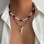 Lot de 2 colliers bohème coquillages et pendentif dent de requin marron