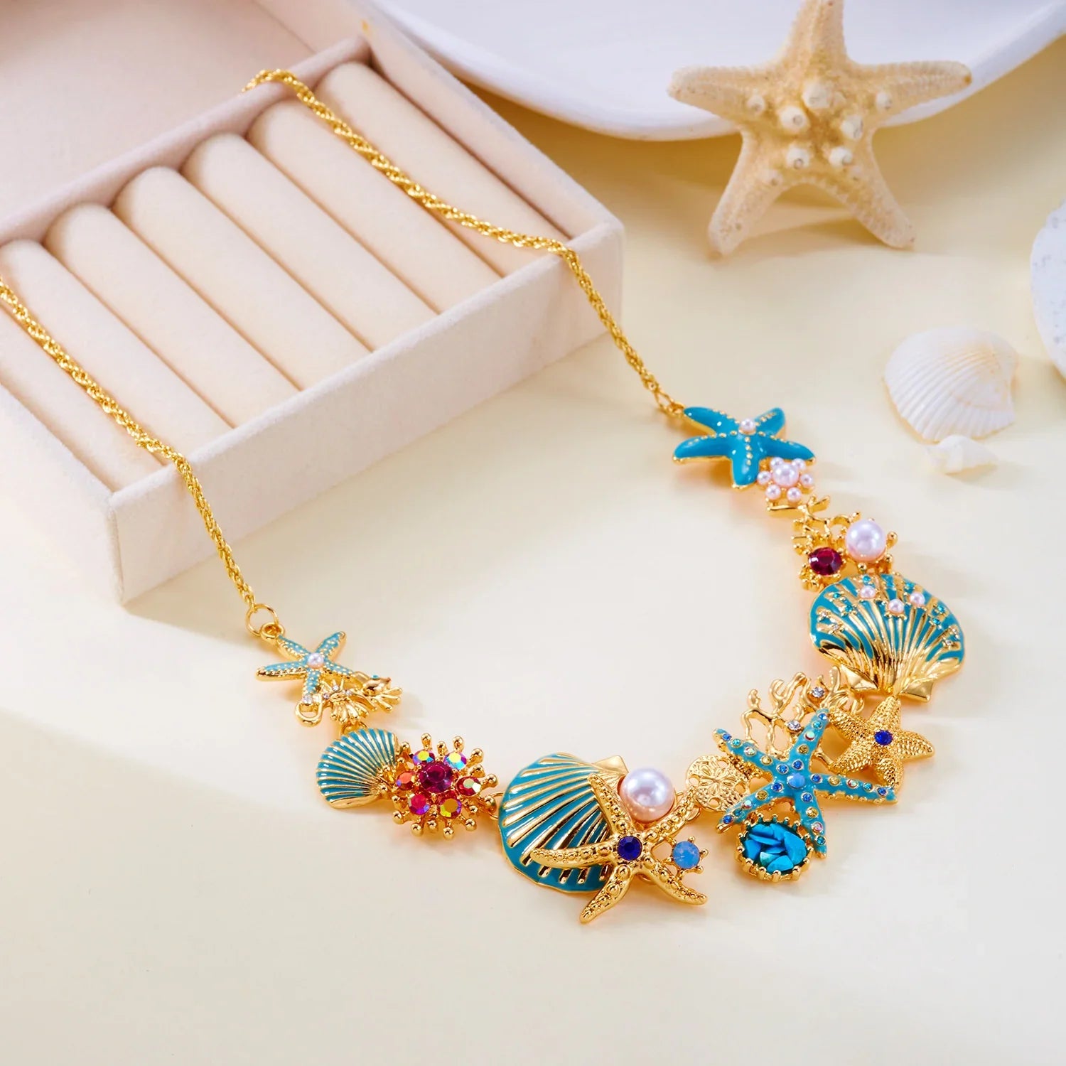 Collier coquillage doré et bleuté