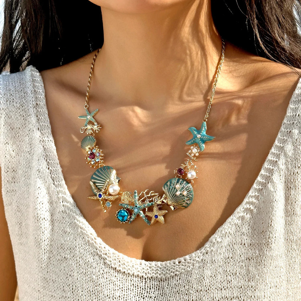 Collier coquillage doré et bleuté