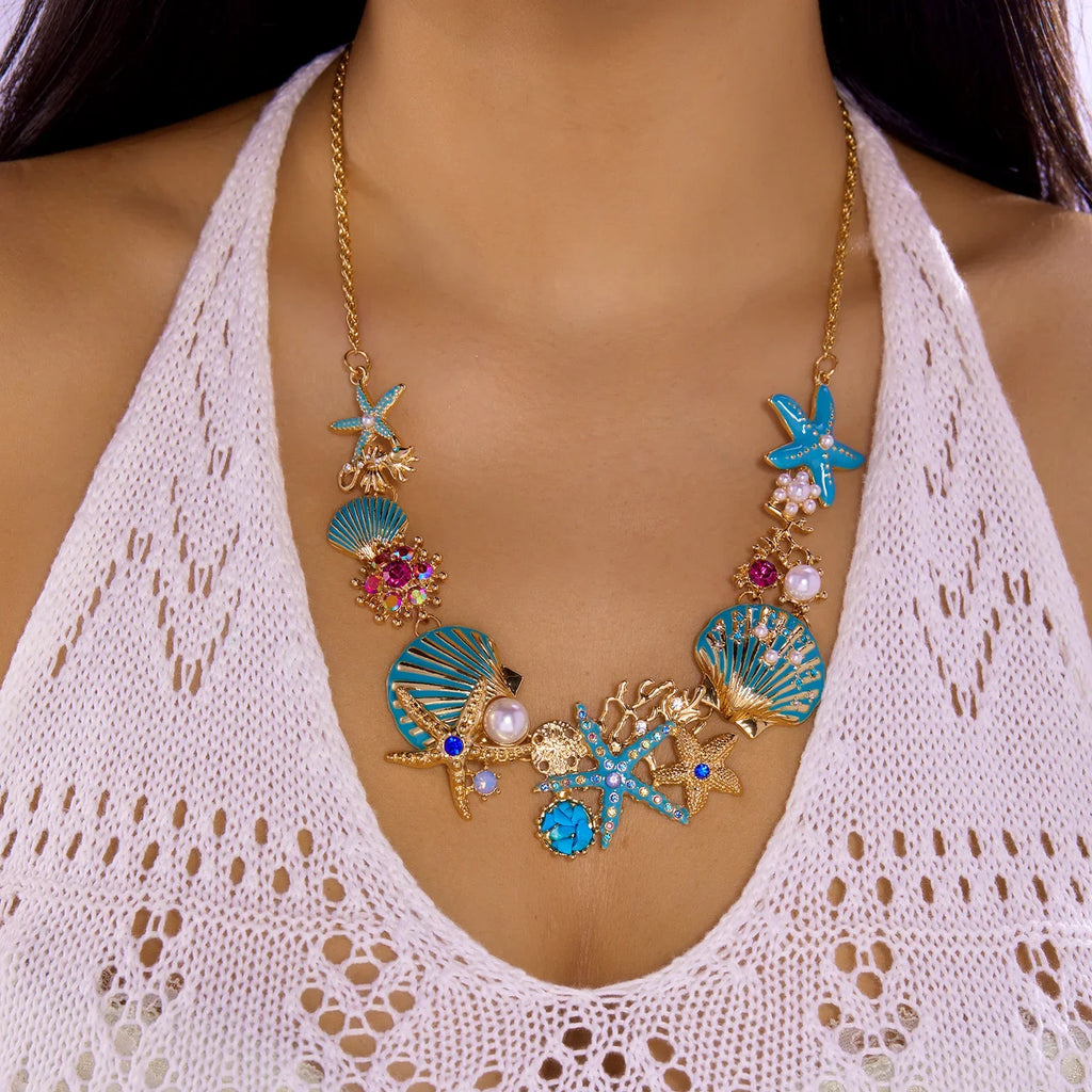 Collier coquillage doré et bleuté