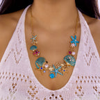 Collier coquillage doré et bleuté