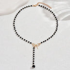 Pearl Necklace with Knot Pendant 