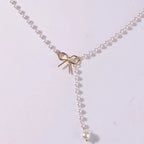 Pearl Necklace with White Knot Pendant