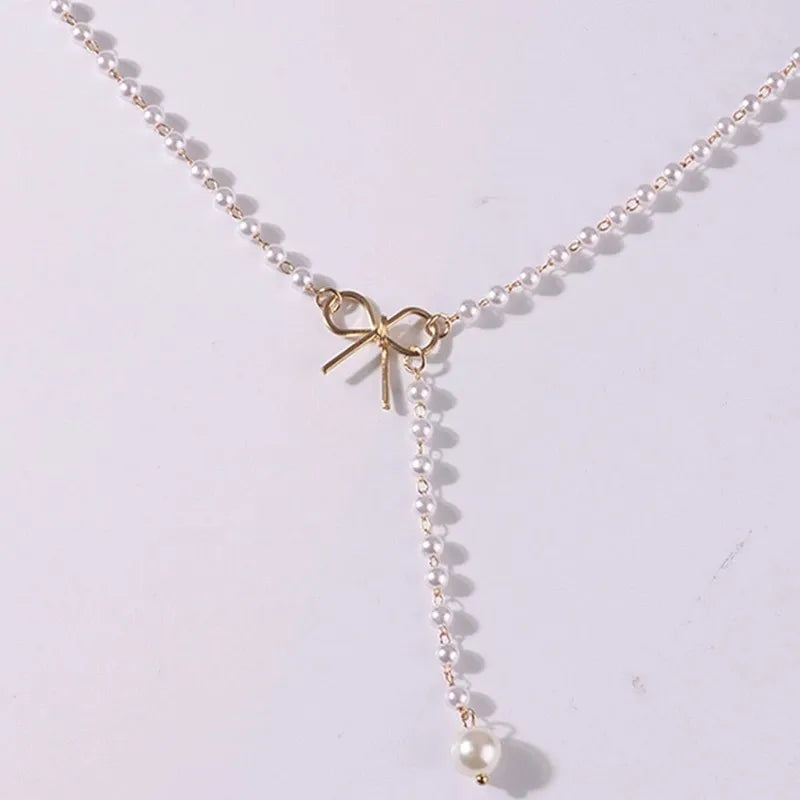 Pearl Necklace with White Knot Pendant