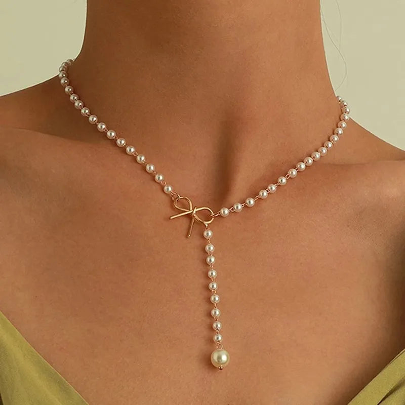 Pearl Necklace with White Knot Pendant