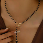 Pearl Necklace with Black Knot Pendant